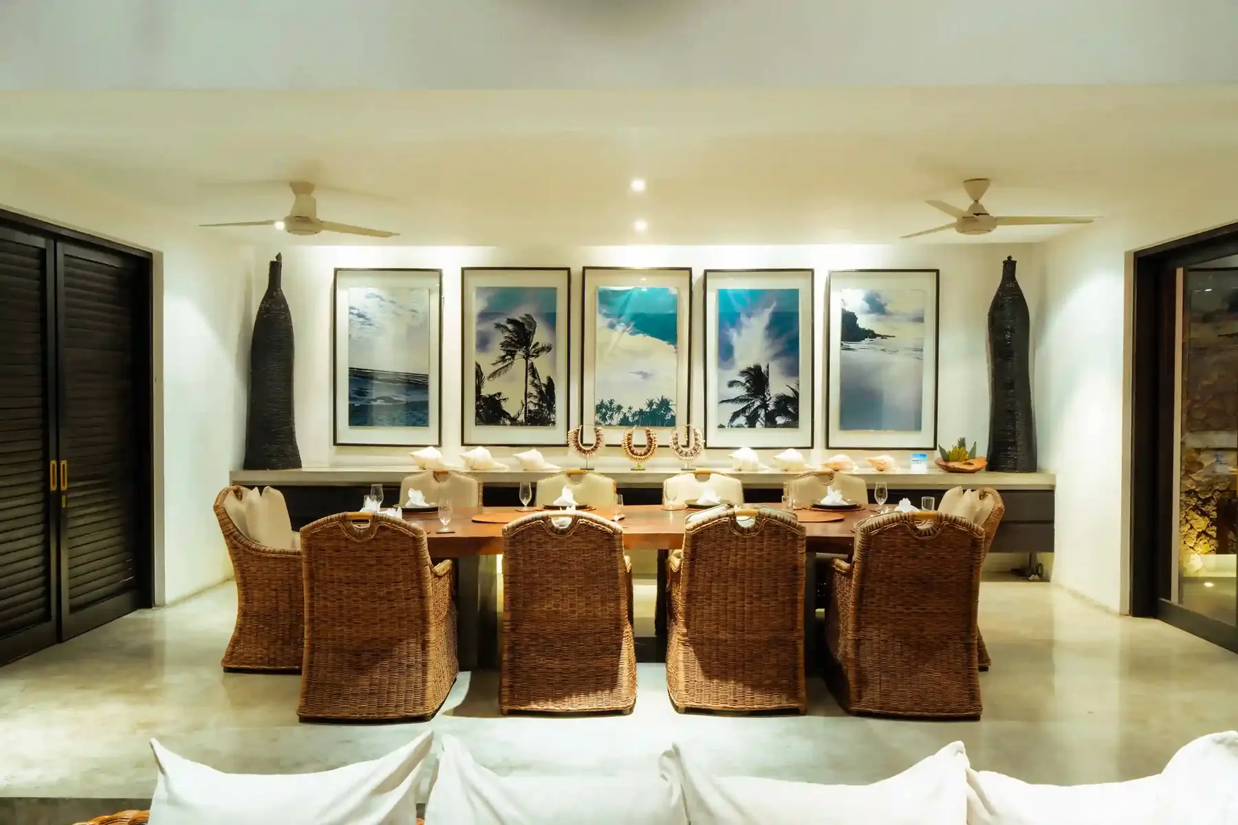 Dining table with hand-woven rattan chairs