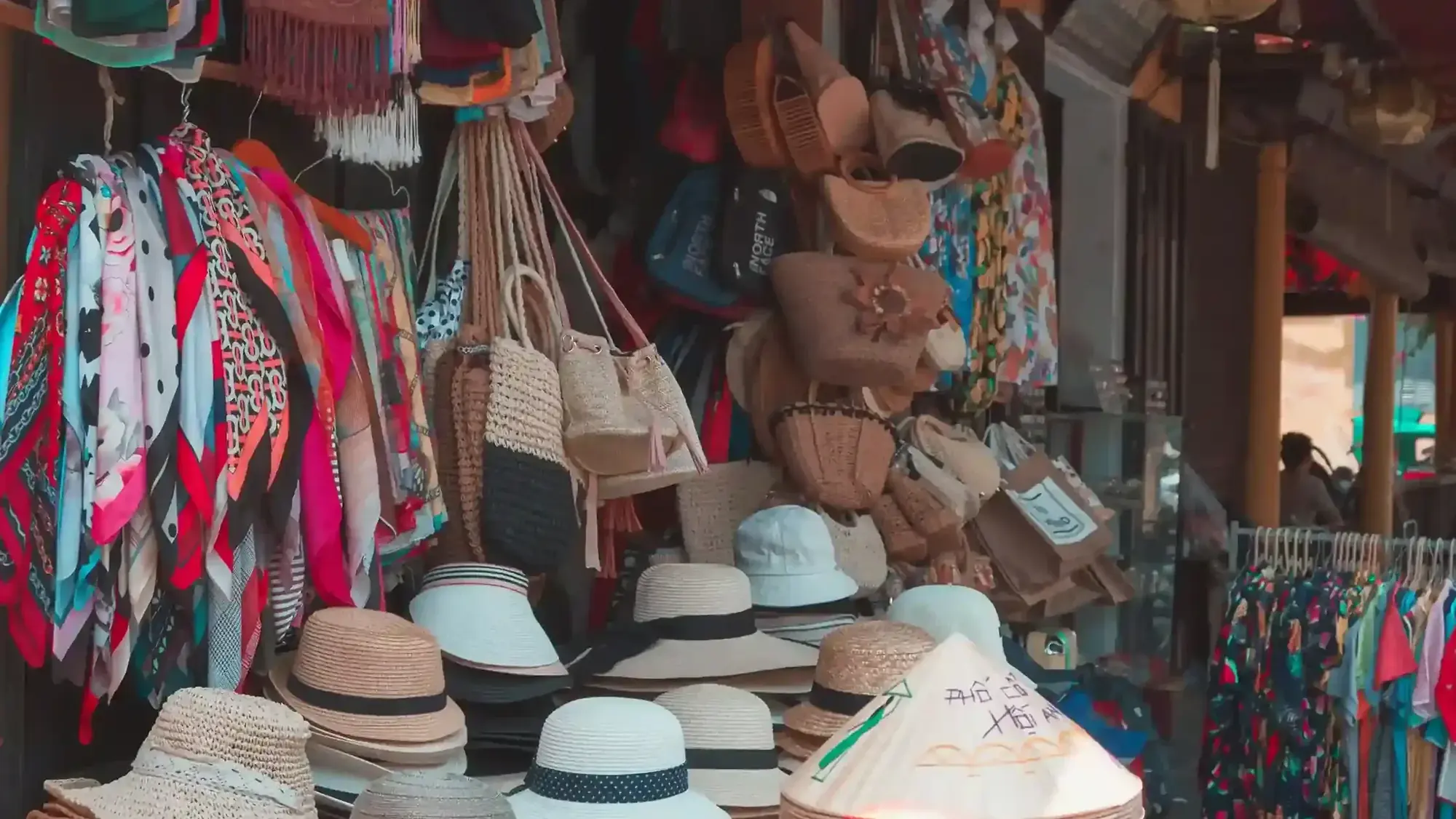 Woven bags and sun hats on display at Ubud Art Market, Bali