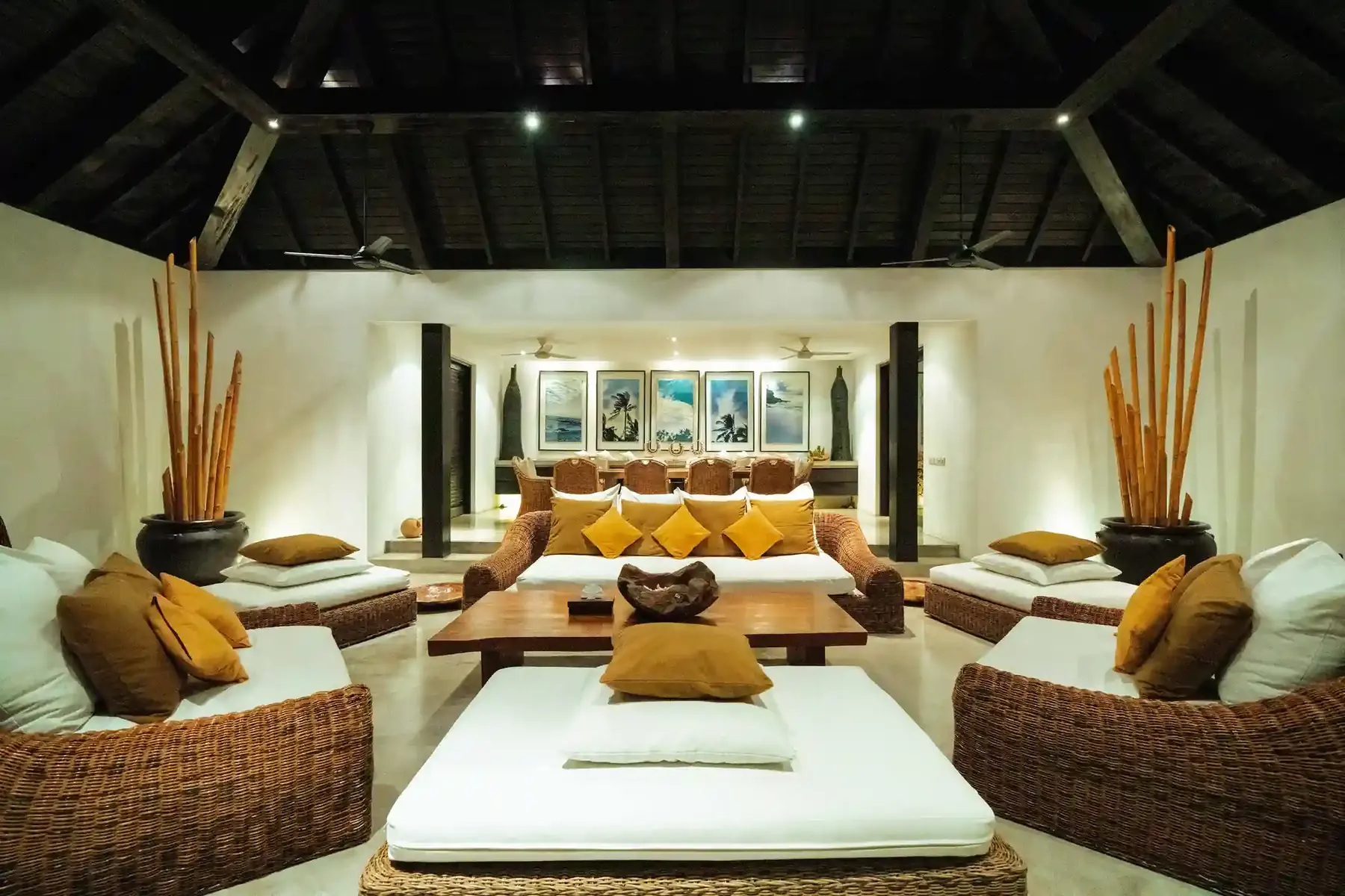 Villa living room furnished with woven rattan armchairs