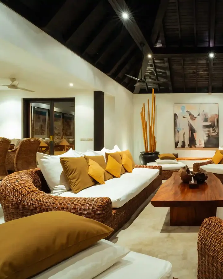 Woven armchairs in a Bali villa lounge